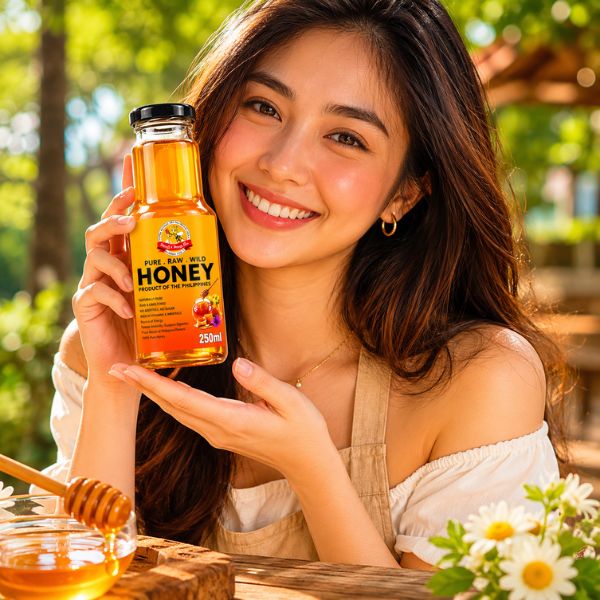 Nancy holding honey